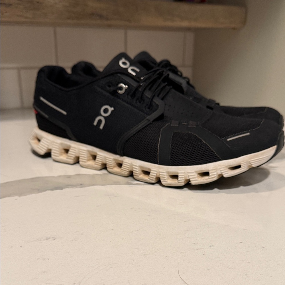 On Running Black Athletic Trainers with Cream CloudTec Midsole